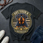 Rottweiler Got Your 6 t-shirt design featuring a tactical badge with Rottweiler portrait on a black Comfort Colors tee